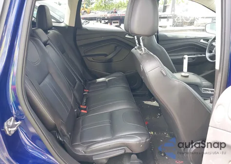 2013 Ford Escape Titanium z USA, uszkodzony, nr VIN 1FMCU0J95DUD37885